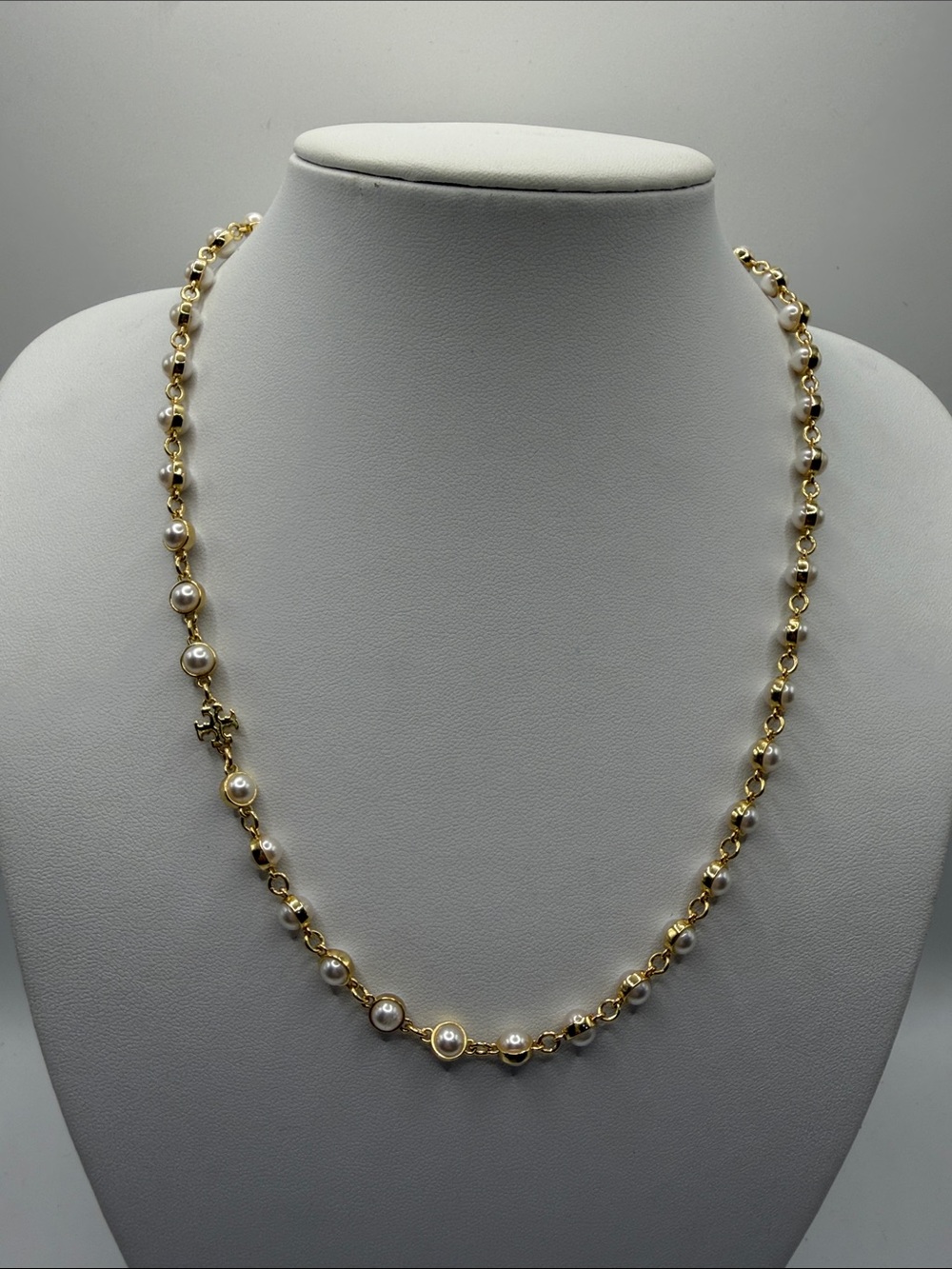 034. Tory Burch Gold and White Pearl Station Necklace 17” - 19”